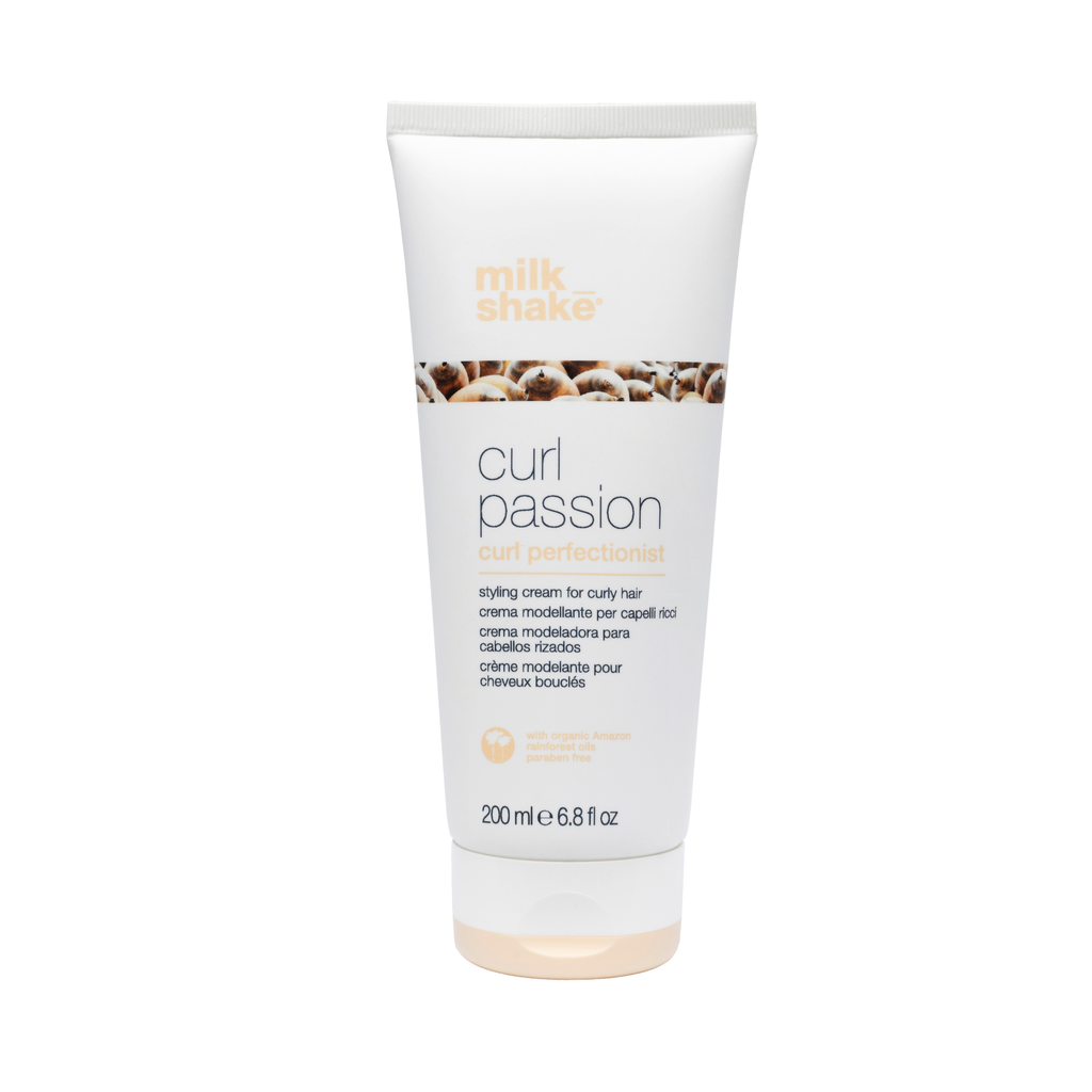 Tube of milk_shake curl passion styling cream on a white background