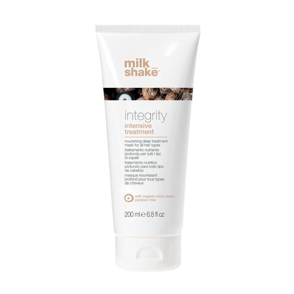 Tube of milk_shake integrity intensive treatment for damaged hair on a white background